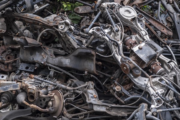 Crushed cars in scrap yard UK