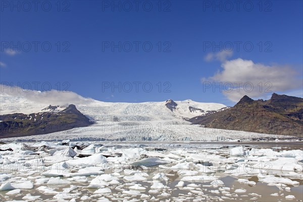 View over the glacier lake Fjallsarlon and Icelandic glacier Fjallsjoekull