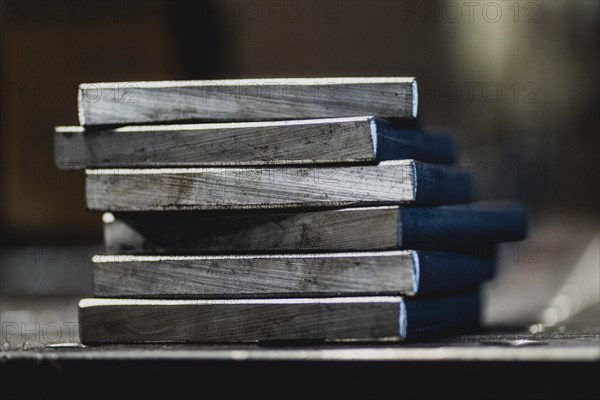 Metal plates lying on a workbench