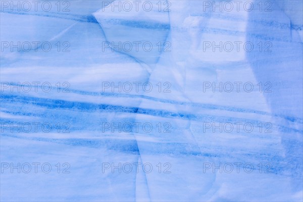 Blue ice layers at edge of the Brasvellbreen glacier from ice cap Austfonna debouching into the Barents Sea