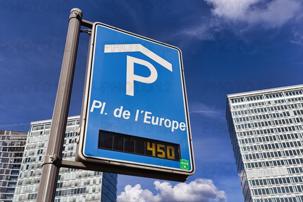 Blue sign with pictogram car park