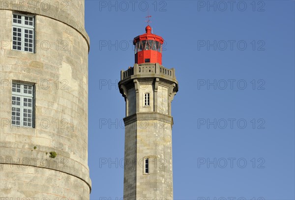 The old Tour Vauban and the new lighthouse Phare des Baleines on the island Ile de Re