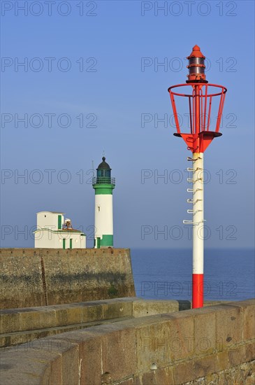 Lighthouse and marine beacon on jetty at Le Treport