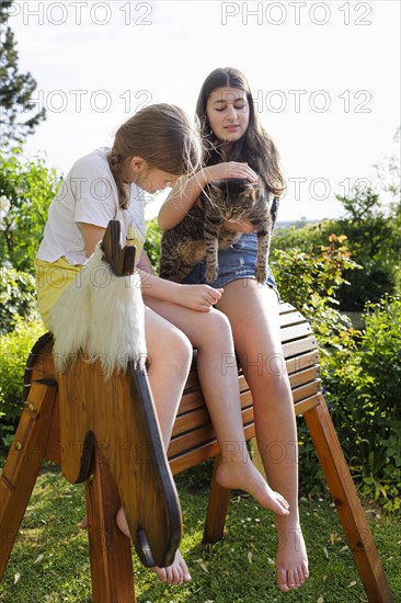 Girl gymnastics on a wooden horse