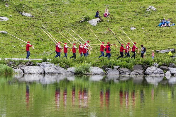 Alphorn concert at the Seealpsee mountain lake