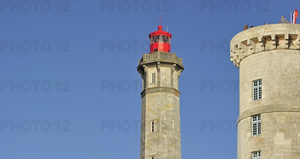 The old Tour Vauban and the new lighthouse Phare des Baleines on the island Ile de Re