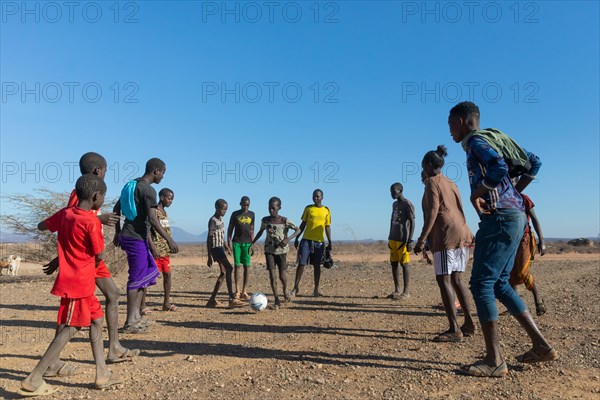 Group of young men playing football