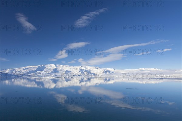 Snow covered mountains along the Joekulsarlon glacier lagoon in winter