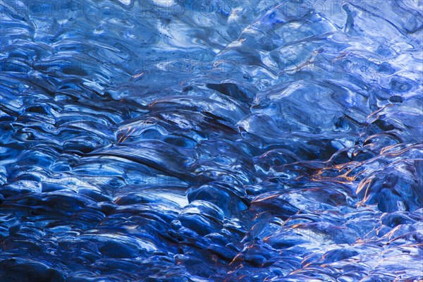 Close-up detail of blue ice in natural glacial cave in the Breioamerkurjoekull