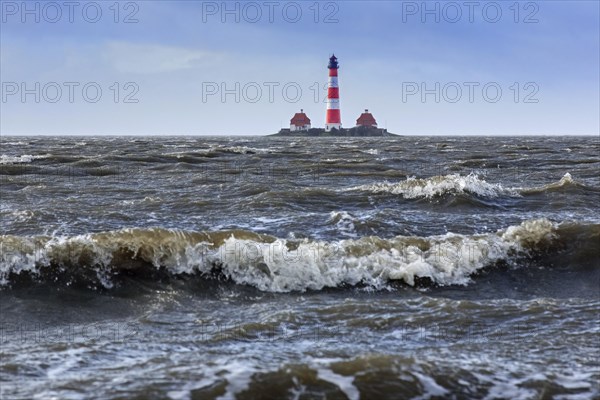 Lighthouse Westerheversand at Westerhever during high water spring tide