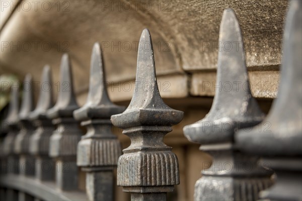 Iron fence in front of a building