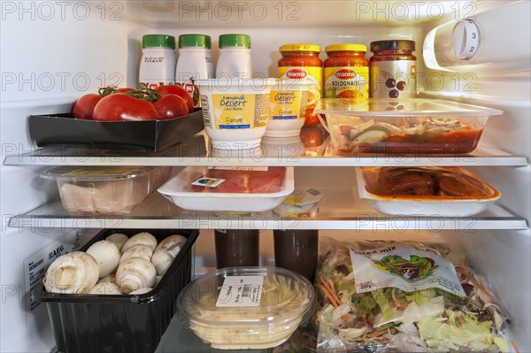Cooled food in open fridge
