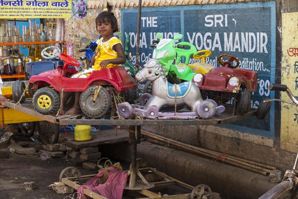 Temporary children's carousel with little girl