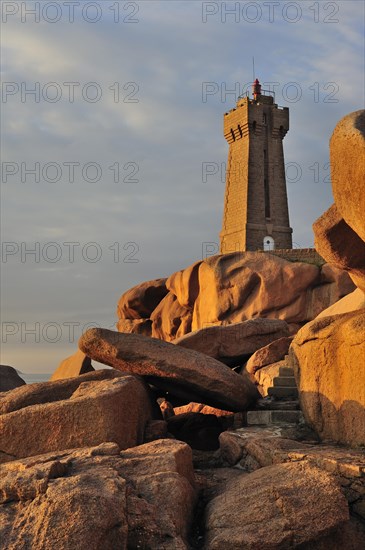 The Pors Kamor lighthouse at sunset along the Cote de granit rose