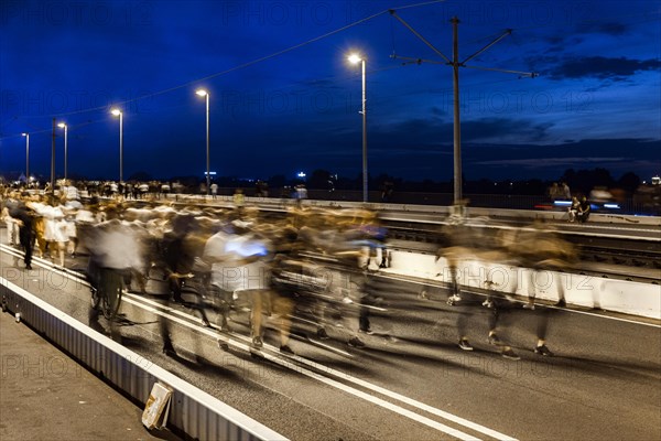 Crowds on the Oberkassel bridge after the fireworks of the Rheinkirmes