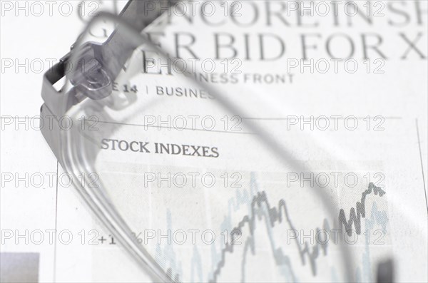 Financial Newspaper and Eyeglasses