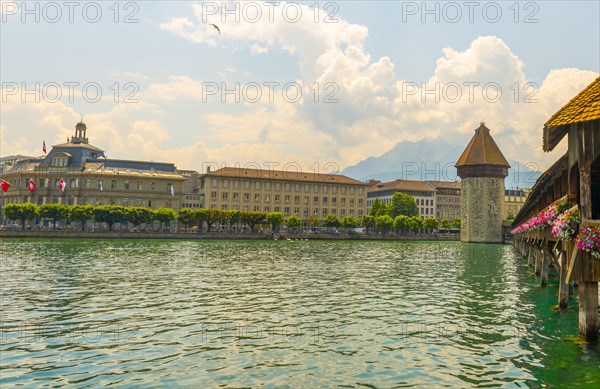City of Lucerne with Chapel Bridge Tower in a Sunny Day in Switzerland