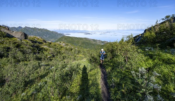 Hikers on trail to Dronningsvarden or Stortinden