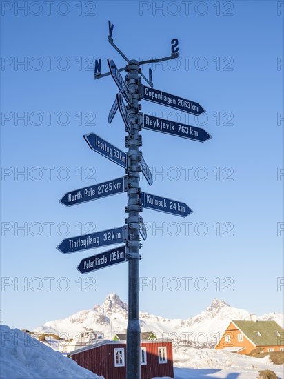 Signpost in Tasiilaq in winter