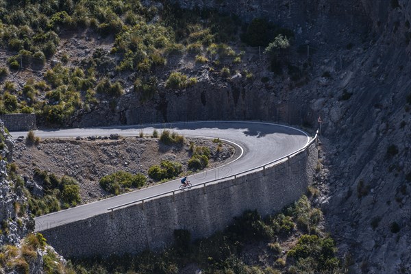 Road cyclist in a curve