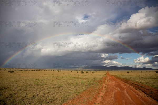 Beautiful wide landscape up to the horizomt and rainbows in the savannah of the Taita Hills Wildlife Sanctuary