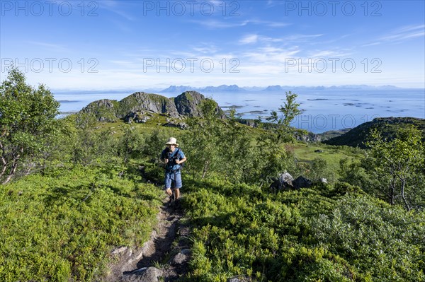 Hikers on trail to Dronningsvarden or Stortinden