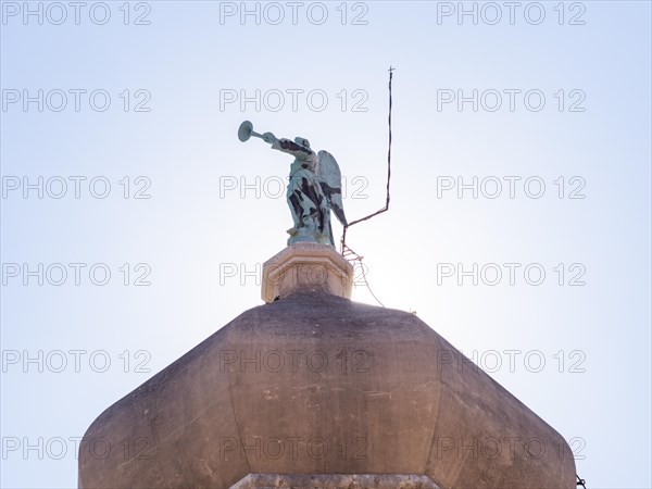 Trumpet-playing angel