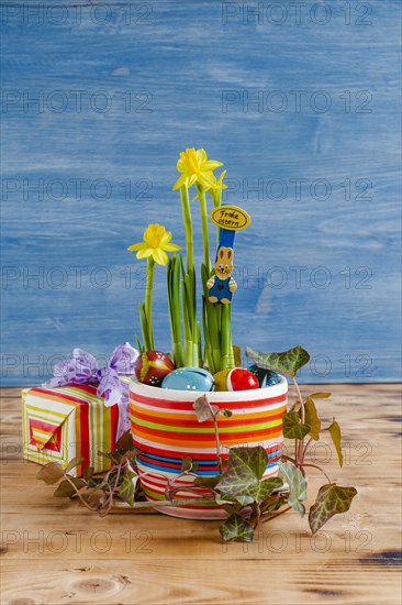 Easter decoration with daffodils in a pot