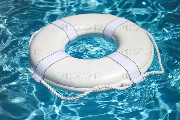 White life buoy in pool