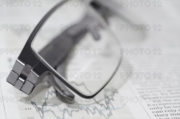 Financial Newspaper and Eyeglasses