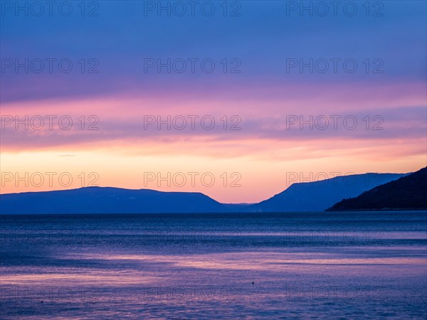 Evening glow over the sea after sunset