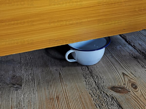 Chamber pot under the bed