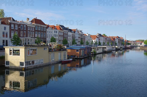 Houseboats and houses on a canal in Middelburg