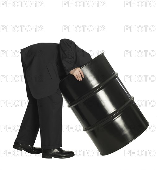 Man and oil barrel