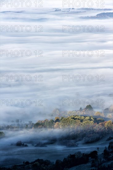 View from the Zeller Horn on misty landscape of the Swabian Alb