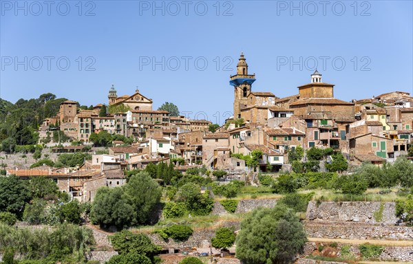 View of Valldemossa mountain village with typical stone houses