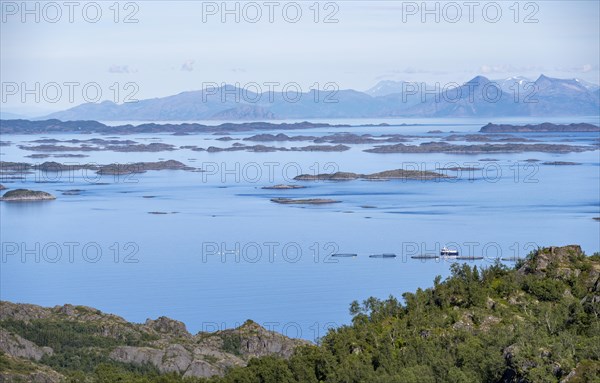 View of sea with archipelago islands from Svellingsflaket and mountains