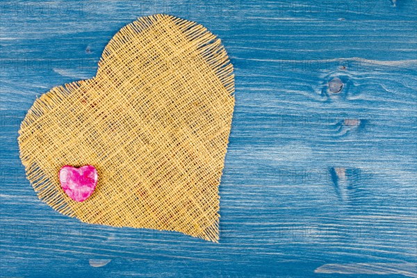 Linen heart on blue background