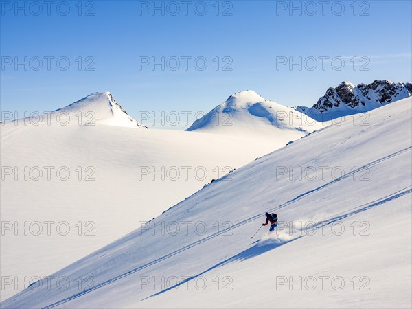 Downhill skiing