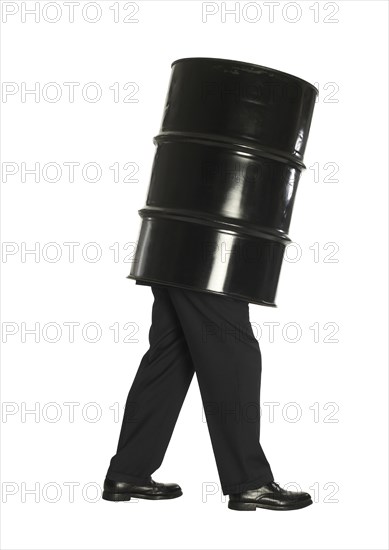 Man and oil barrel