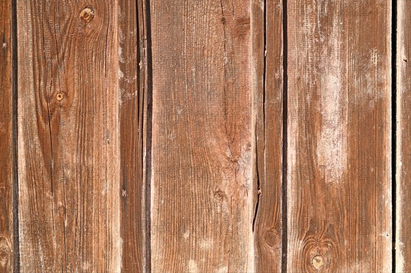 Wooden background with brown colored planks