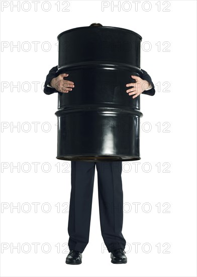 Man and oil barrel