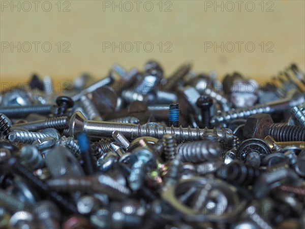 Industrial steel hardware bolt nut screw washer background