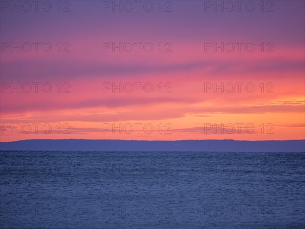 Evening glow over the sea after sunset