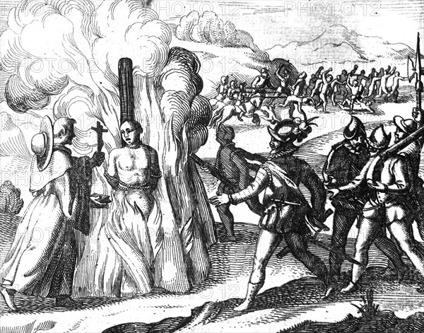 The Spaniards burn a man at the stake. A member of the clergy or priest holds out a Bible and a crucifix to the man who is to be burned or tortured. Spaniards on horseback pursuing Native Americans in the background
