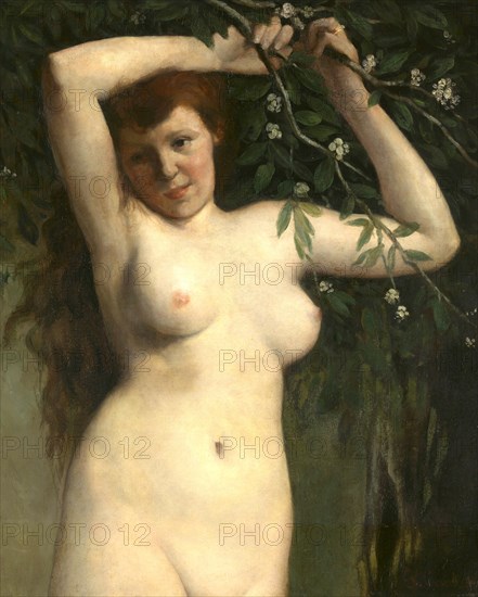 Nude portrait of a woman with a flowering branch
