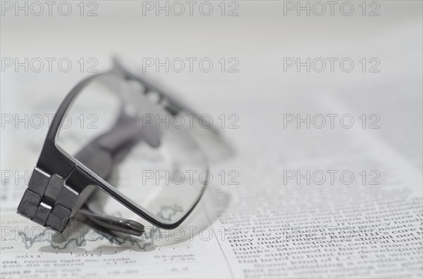 Financial Newspaper and Eyeglasses