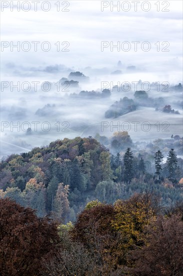 View from the Zeller Horn on misty landscape of the Swabian Alb