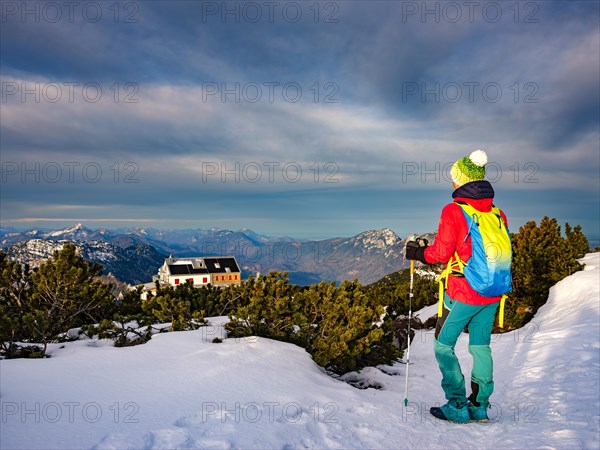 Mountaineer on a snowy path near the Stoehrhaus