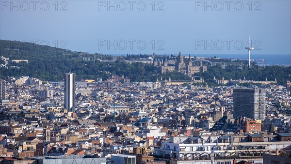 View over the city with Palau Nacional and Torre de Comunicacions de Montjuic